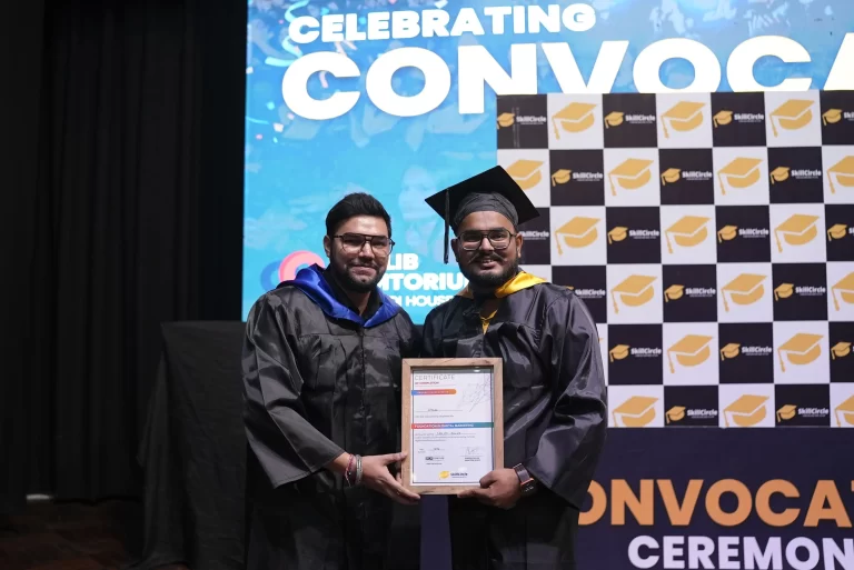 A SkillCircle graduate receiving a certificate on stage